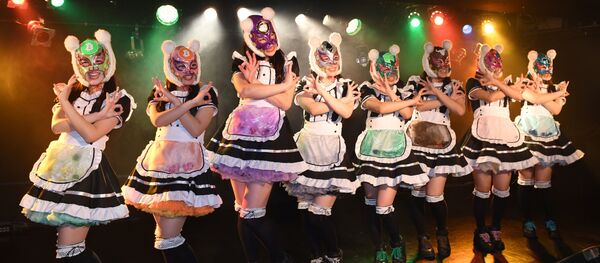 Female idol group Kasotsuka Shojo (Virtual Currency Girls), produced by Japanese idol agency Cinderella Academy, pose on stage in Tokyo - Sputnik International