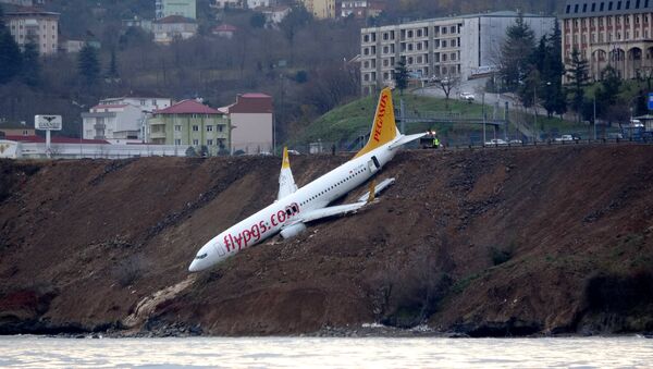 A Pegasus Airlines aircraft is pictured after it skidded off the runway at Trabzon airport by the Black Sea in Trabzon, Turkey, January 14, 2018 - Sputnik International