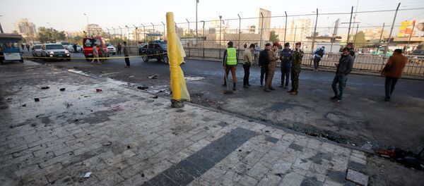 Iraqi security forces inspect the site of a bomb attack in Baghdad, Iraq January 15, 2018 Iraqi security forces inspect the site of a bomb attack in Baghdad, Iraq January 15, 2018 - Sputnik International