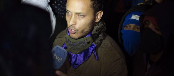 Oscar Perez speaks to the press at a night vigil to honor the more than 90 people killed during three months of anti-government protests, in Caracas, Venezuela. (File) Oscar Perez speaks to the press at a night vigil to honor the more than 90 people killed during three months of anti-government protests, in Caracas, Venezuela. (File) - Sputnik International