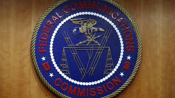 The seal of the Federal Communications Commission (FCC) is seen before an FCC meeting to vote on net neutrality in Washington. (File) - Sputnik International