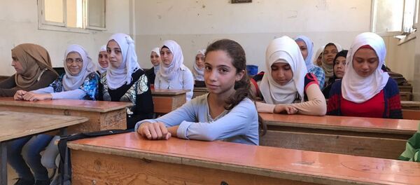 Russian lesson at a school for girls in Deir ez-Zor Russian lesson at a school for girls in Deir ez-Zor - Sputnik International