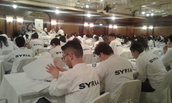 Syrian students taking part in the final round of competition in the country's Scientific Olympiad. Syrian students taking part in the final round of competition in the country's Scientific Olympiad. - Sputnik International