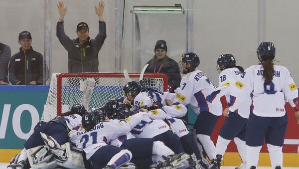 South Korean players celebrate after winning against the Netherlands during their IIHF Ice Hockey Women's World Championship Division II Group A game in Gangneung, South Korea. (File) - Sputnik International