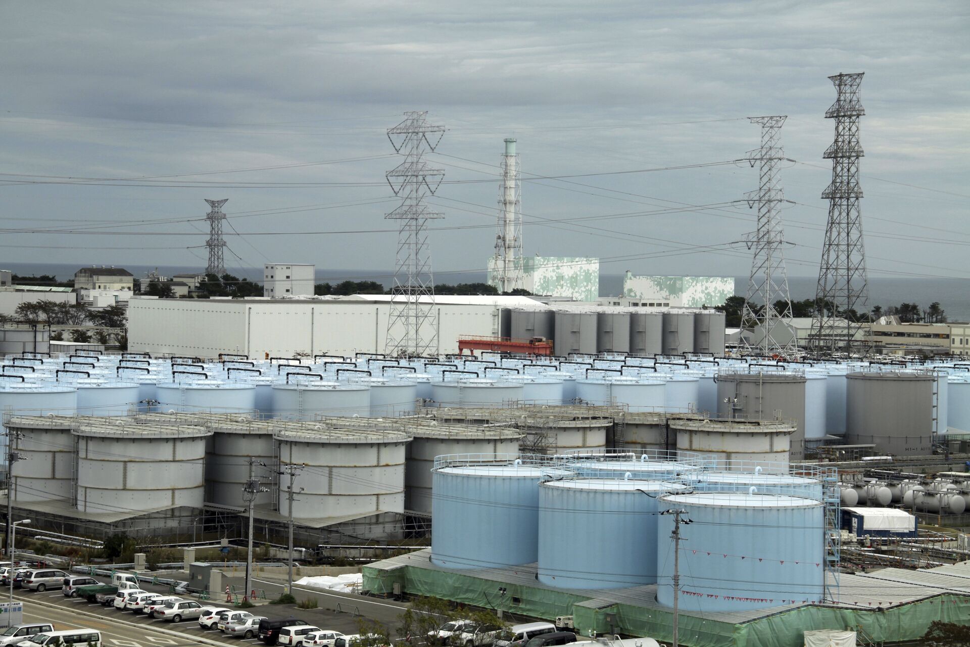 In this Oct. 12, 2017, photo, ever-growing amount of contaminated, treated but still slightly radioactive, water at the wrecked Fukushima Dai-ichi nuclear plant is stored in about 900 huge tanks, including those seen in this photo taken during a plant tour at Fukushima Daiichi Nuclear Power Plant in Okuma, Fukushima Prefecture, northeast of Tokyo - Sputnik International, 1920, 07.07.2023