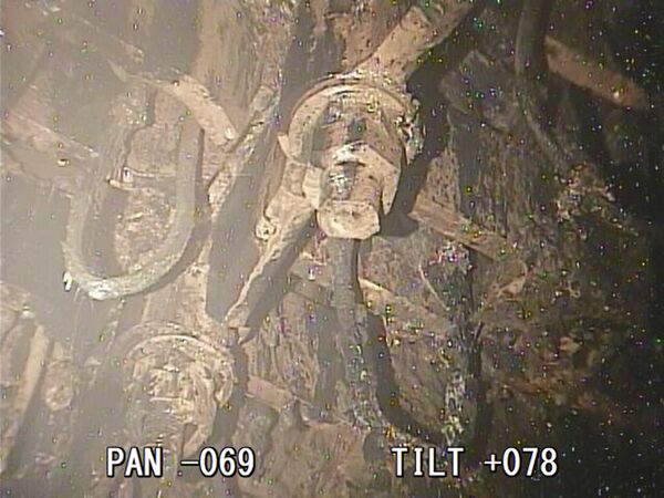 A photo taken by a robotic probe provided by the International Research Institute for Nuclear Decommissioning, Friday, Jan. 19, 2018, shows a view of the bottom of a structure housing a safety system called the control rod drive, which appeared rusty and coated with unidentified material at the Fukushima nuclear plant A photo taken by a robotic probe provided by the International Research Institute for Nuclear Decommissioning, Friday, Jan. 19, 2018, shows a view of the bottom of a structure housing a safety system called the control rod drive, which appeared rusty and coated with unidentified material at the Fukushima nuclear plant - Sputnik International