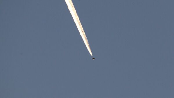 A Turkish fighter jet flies over the town of Hassa on the Turkish-Syrian border in Hatay province, Turkey January 20, 2018 - Sputnik International
