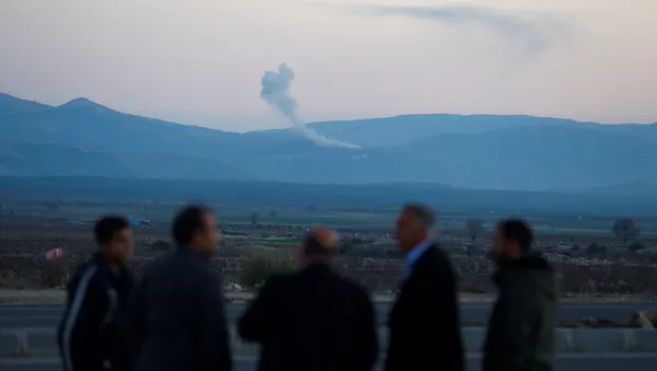 Smoke rises from the Syria's Afrin region, as it is pictured from near the Turkish town of Hassa, on the Turkish-Syrian border in Hatay province, Turkey January 20, 2018 - Sputnik International
