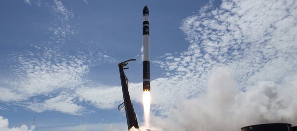In this photo provided by Rocket Lab, Electron rocket carrying only a small payload of about 150 kilograms (331 pounds), lifts off from the Mahia Peninsula on New Zealand's North Island's east coast In this photo provided by Rocket Lab, Electron rocket carrying only a small payload of about 150 kilograms (331 pounds), lifts off from the Mahia Peninsula on New Zealand's North Island's east coast - Sputnik International