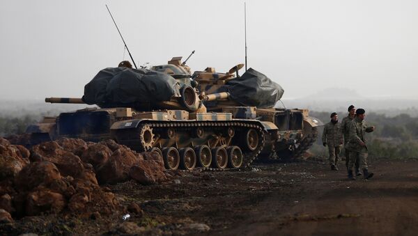 Turkish soldiers and tanks are pictured in a village on the Turkish-Syrian border in Gaziantep province, Turkey January 22, 2018 - Sputnik International