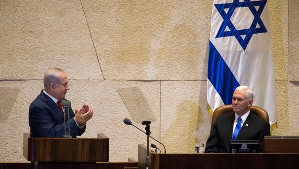 Israeli Prime Minister Benjamin Netanyahu applauds U.S. Vice President Mike Pence ahead of his address to the Knesset, Israeli Parliament, in Jerusalem - Sputnik International