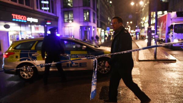 Police tape blocks the Strand near Charing Cross station after it was shut due to a gas leak, in London, Britain, January 23, 2018 - Sputnik International