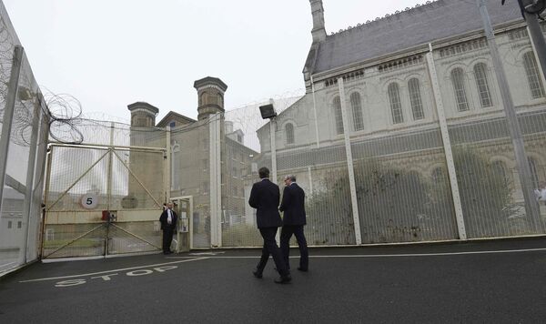 Britain's Prime Minister David Cameron is escorted by prison governor Phil Taylor (R), during his visit to Wormwood Scrubs Prison in west London on October 22, 2012 Britain's Prime Minister David Cameron is escorted by prison governor Phil Taylor (R), during his visit to Wormwood Scrubs Prison in west London on October 22, 2012 - Sputnik International