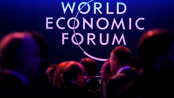 A logo of the World Economic Forum (WEF) is seen as people attend the WEF annual meeting in Davos, Switzerland January 24, 2018 - Sputnik International