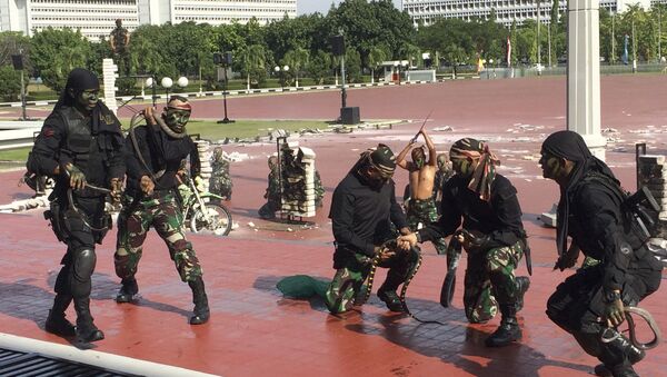 Indonesian special forces demonstrate snake-handling Wednesday, Jan. 24, 2018, for U.S. Defense Secretary Jim Mattis in Jakarta, Indonesia. - Sputnik International