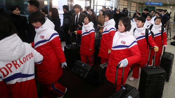 North Korea's women ice hockey athletes arrive at the South's CIQ (Customs, Immigration and Quarantine), just south of the demilitarized zone separating the two Koreas in Paju - Sputnik International