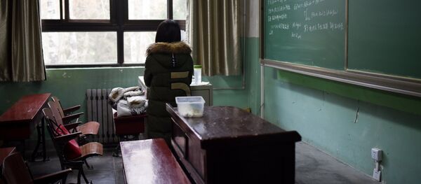 A female student in a classroom at Beihang University in Beijing. File photo - Sputnik International