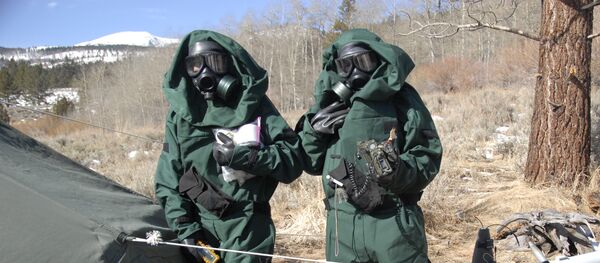 California National Guard troops in hazmat suits. California National Guard troops in hazmat suits. - Sputnik International