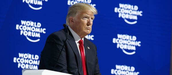 President Donald Trump listens as he is introduced to deliver a speech to the World Economic Forum, Friday, Jan. 26, 2018, in Davos President Donald Trump listens as he is introduced to deliver a speech to the World Economic Forum, Friday, Jan. 26, 2018, in Davos - Sputnik International