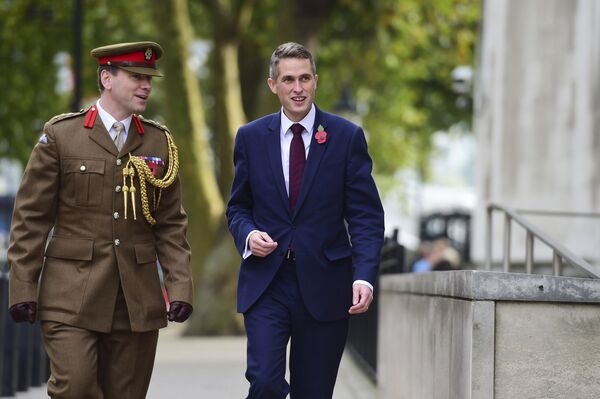 Gavin Williamson, right, outside the Ministry of Defence in London after he was named as the new Secretary of State for Defence following the resignation of Sir Michael Fallon who admitted his behaviour had fallen below the high standards required in the role, Thursday, Nov. 2, 2017. Gavin Williamson, right, outside the Ministry of Defence in London after he was named as the new Secretary of State for Defence following the resignation of Sir Michael Fallon who admitted his behaviour had fallen below the high standards required in the role, Thursday, Nov. 2, 2017. - Sputnik International