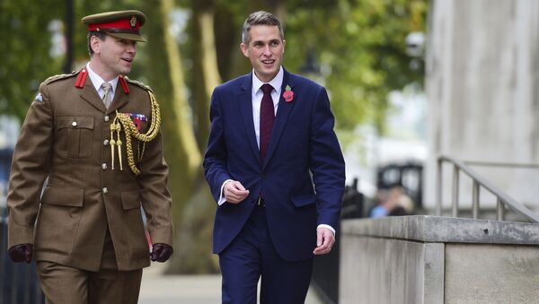 Gavin Williamson, right, outside the Ministry of Defence in London after he was named as the new Secretary of State for Defence following the resignation of Sir Michael Fallon who admitted his behaviour had fallen below the high standards required in the role, Thursday, Nov. 2, 2017. - Sputnik International