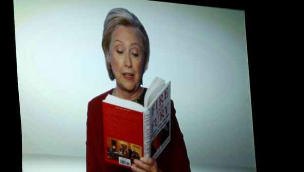 Hillary Clinton appears on screen reading an excerpt from the book Fire and Fury during a skit at the 60th annual Grammy Awards at Madison Square Garden on Sunday, Jan. 28, 2018, in New York - Sputnik International