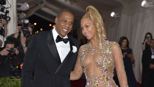In this May 4, 2015, file photo, Jay Z, left, and Beyonce arrive at The Metropolitan Museum of Art's Costume Institute benefit gala celebrating China: Through the Looking Glass in New York - Sputnik International