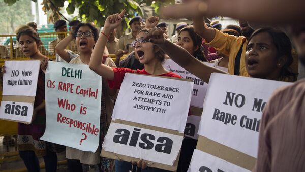 (File) Indian students shout slogans during a protest against the latest incidents of rape in New Delhi, India, Sunday, Oct. 18, 2015 - Sputnik International