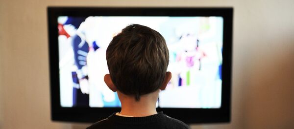 Сhild is watching TV - Sputnik International