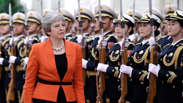British Prime Minister Theresa May reviews honour guards during a welcoming ceremony at the Great Hall of the People in Beijing, China January 31, 2018 - Sputnik International