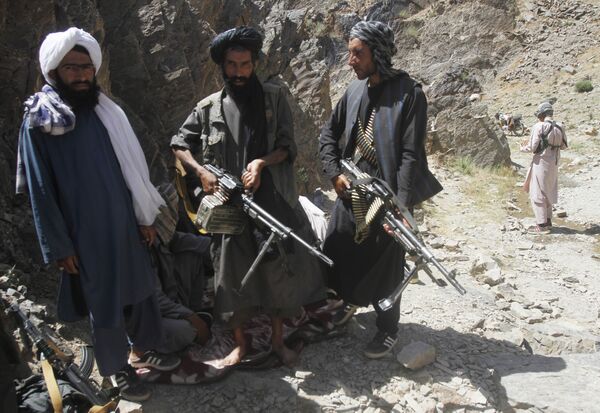 Members of a breakaway faction of the Taliban fighters guard during a patrol in Shindand district of Herat province, Afghanistan (File) Members of a breakaway faction of the Taliban fighters guard during a patrol in Shindand district of Herat province, Afghanistan (File) - Sputnik International