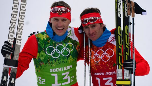 From left: Nikita Kryukov (Russia) and Maxim Vylegzhanin (Russia) at the finish of the final round of the team sprint in men’s cross-country skiing at the XXII Olympic Winter Games in Sochi - Sputnik International