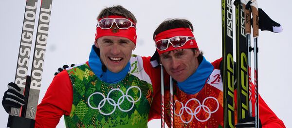 From left: Nikita Kryukov (Russia) and Maxim Vylegzhanin (Russia) at the finish of the final round of the team sprint in men’s cross-country skiing at the XXII Olympic Winter Games in Sochi - Sputnik International