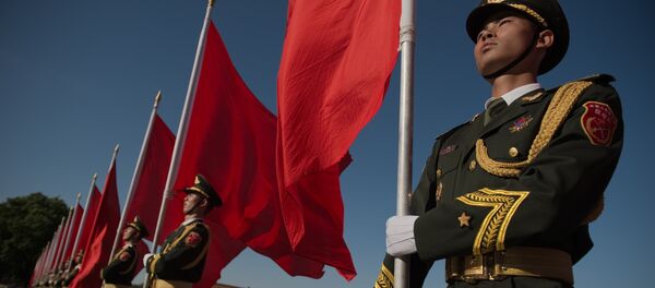 Members of a Chinese military honour guard hold red flags before a welcome ceremony for Afghanistan's Chief Executive Officer Abdullah Abdullah in Beijing on May 16, 2016 Members of a Chinese military honour guard hold red flags before a welcome ceremony for Afghanistan's Chief Executive Officer Abdullah Abdullah in Beijing on May 16, 2016 - Sputnik International