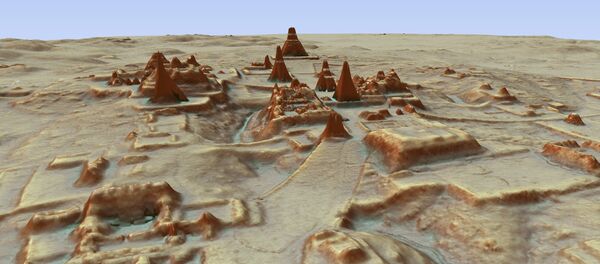 This digital 3D image provided by Guatemala's Mayan Heritage and Nature Foundation, PACUNAM, shows a depiction of the Mayan archaeological site at Tikal in Guatemala created using LiDAR aerial mapping technology. Researchers announced Thursday, Feb. 1, 2018, that using a high-tech aerial mapping technique they have found tens of thousands of previously undetected Mayan houses, buildings, defense works and roads in the dense jungle of Guatemala's Peten region, suggesting that millions more people lived there than previously thought - Sputnik International
