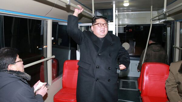 North Korean leader Kim Jong Un attends the trial of a trackless tramway, in this undated photo released by North Korea's Korean Central News Agency (KCNA) in Pyongyang February 4, 2018 - Sputnik International