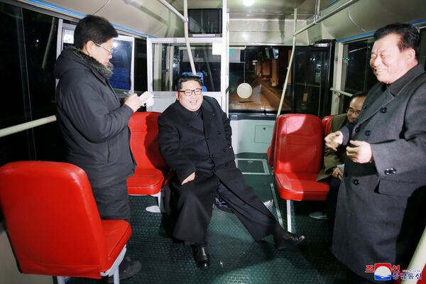 North Korean leader Kim Jong Un attends the trial of a trackless tramway, in this undated photo released by North Korea's Korean Central News Agency (KCNA) in Pyongyang February 4, 2018 - Sputnik International