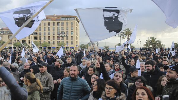 Residents of the Corsica island take the streets in Ajaccio, France, as they demonstrate ahead of a visit to the Mediterranean island next week by French President Emmanuel Macron, Saturday, Feb. 3, 2018 - Sputnik International