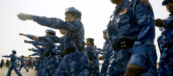 The United Nations' first all-female peacekeeping force of more than 100 Indian policewomen walks upon arrival at Roberts international airport in Monrovia. (File) - Sputnik International