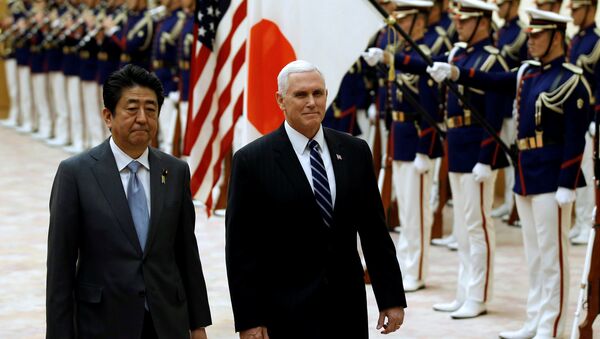 U.S. Vice President Mike Pence and Japan's Prime Minister Shinzo Abe review an honor guard before their meeting at Abe's official residence in Tokyo, Japan, February 7, 2018 - Sputnik International