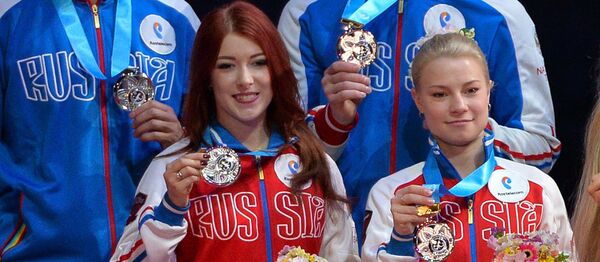 Yevgeniya Tarasova (right) and Yekaterina Bobrova during the award ceremony at the 2017 World Team Trophy in Figure Skating in Tokyo. (File) Yevgeniya Tarasova (right) and Yekaterina Bobrova during the award ceremony at the 2017 World Team Trophy in Figure Skating in Tokyo. (File) - Sputnik International