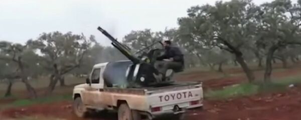 Militants shooting at the Russian Su-25SM fighters. Screenshot. - Sputnik International