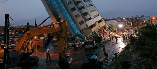 A damaged residential building is seen after an earthquake hit Hualien, Taiwan February 7, 2018 A damaged residential building is seen after an earthquake hit Hualien, Taiwan February 7, 2018 - Sputnik International