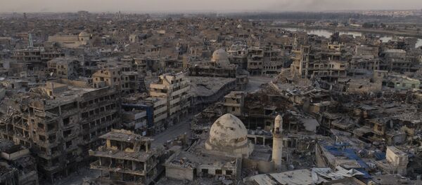 In this Nov. 15, 2017 photo, aerial view of destroyed building and shops in the Old City of Mosul, Iraq In this Nov. 15, 2017 photo, aerial view of destroyed building and shops in the Old City of Mosul, Iraq - Sputnik International
