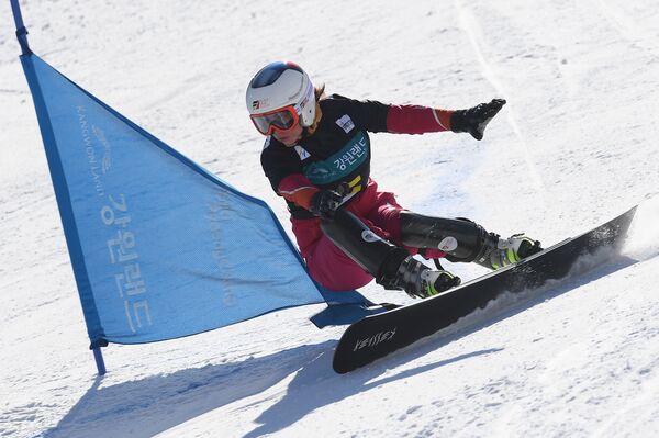 Ekaterina Tudegesheva (Russia) competes in the men's parallel giant slalom at the FIS Snowboard World Cup stage in Pyeongchang. (File) Ekaterina Tudegesheva (Russia) competes in the men's parallel giant slalom at the FIS Snowboard World Cup stage in Pyeongchang. (File) - Sputnik International