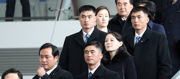 Kim Yo Jong, the younger sister of North Korean leader Kim Jong Un, is escorted by South Korean security guards at the Incheon International Airport, in Incheon, South Korea February 9, 2018 - Sputnik International