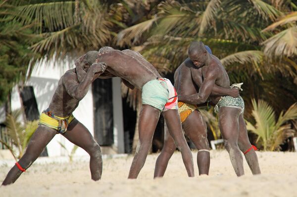 Gambian wrestlers on the beach Gambian wrestlers on the beach - Sputnik International