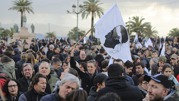 Residents of the Corsica island take the streets in Ajaccio, France, as they demonstrate ahead of a visit to the Mediterranean island next week by French President Emmanuel Macron, Saturday, Feb. 3, 2018 - Sputnik International