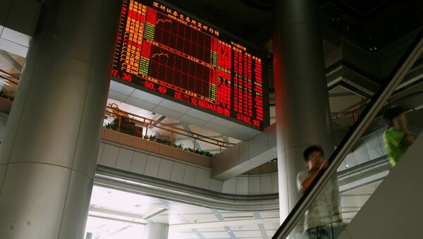 A panel displaying share prices is seen inside the Shenzhen Stock Exchange in the southern Chinese city of Shenzhen (File) - Sputnik International