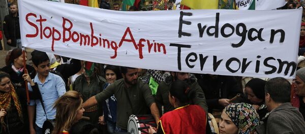 In this Friday, Jan. 26, 2018 file photo, Kurdish demonstrators, protest against the operation by the Turkish army aimed at ousting the U.S.-backed Kurdish militia from the area in Afrin, Syria, in Rabiyeh, east of Beirut, Lebanon. Syria’s Kurdish militia is growing frustrated with its patron, the United States, and is pressing it to do more to stop Turkey’s assault on Afrin. Their complaints reflect the differing agendas. The Kurds want to ensure their self-rule, while the U.S. wants them to focus on governing the territory they wrested from IS militants. In this Friday, Jan. 26, 2018 file photo, Kurdish demonstrators, protest against the operation by the Turkish army aimed at ousting the U.S.-backed Kurdish militia from the area in Afrin, Syria, in Rabiyeh, east of Beirut, Lebanon. Syria’s Kurdish militia is growing frustrated with its patron, the United States, and is pressing it to do more to stop Turkey’s assault on Afrin. Their complaints reflect the differing agendas. The Kurds want to ensure their self-rule, while the U.S. wants them to focus on governing the territory they wrested from IS militants. - Sputnik International